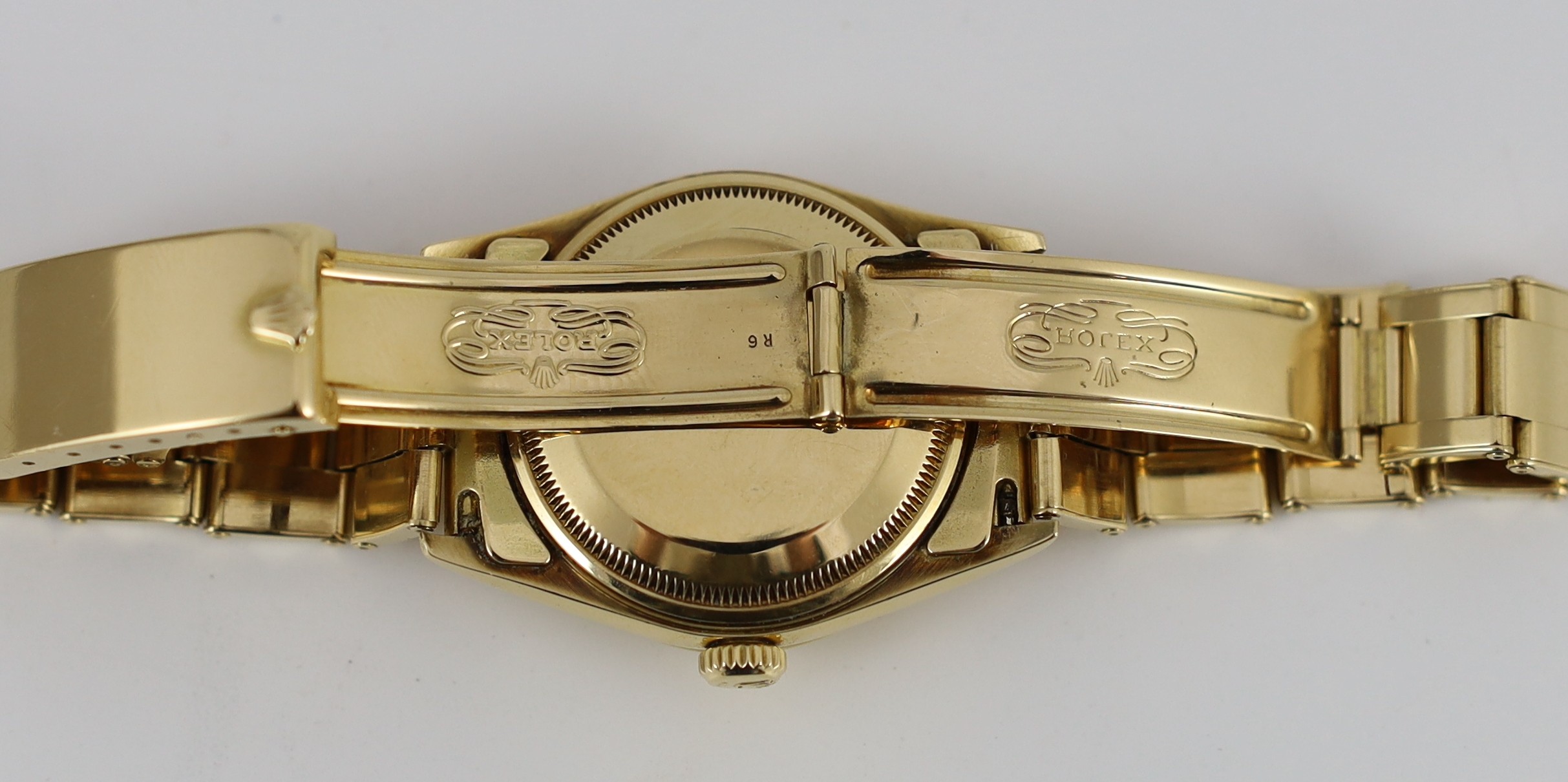 A gentleman's early 1990's 18ct gold Rolex Oyster Perpetual Date wrist watch, on an 18ct gold Rolex bracelet